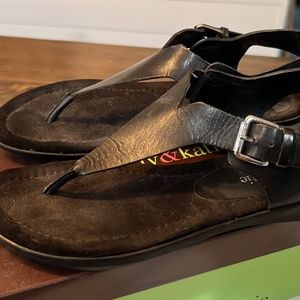 Black leather flat sandals